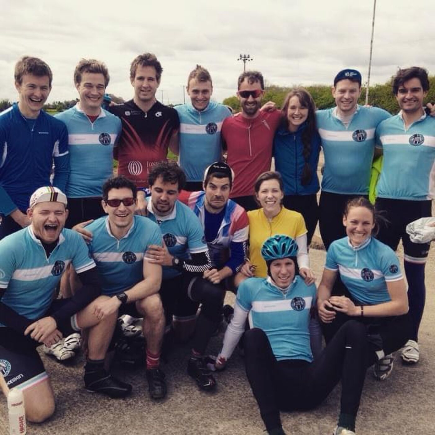 Club members in club kit photographed together at an event, several wearing finishers’ medals